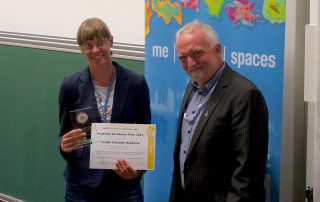 Marijke Bekkema receiving the Academic Excellence Prize at the GI_Forum in Salzburg